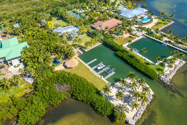 a view of swimming pool with a table and chairs