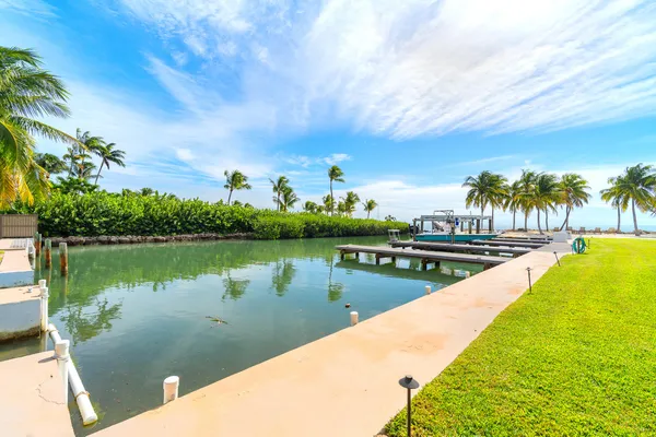 a bath tub sitting in a bathroom next to a window