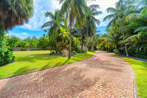 a view of a dining room with furniture large windows and wooden floor
