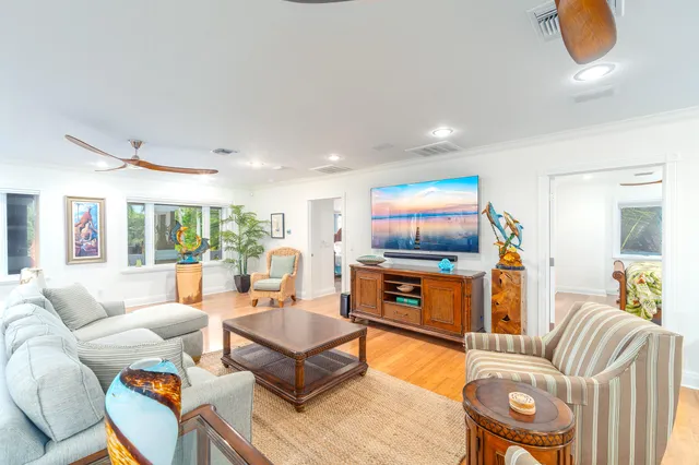 a view of swimming pool with chairs