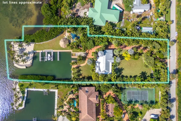 a kitchen with a stove a sink and a counter top space