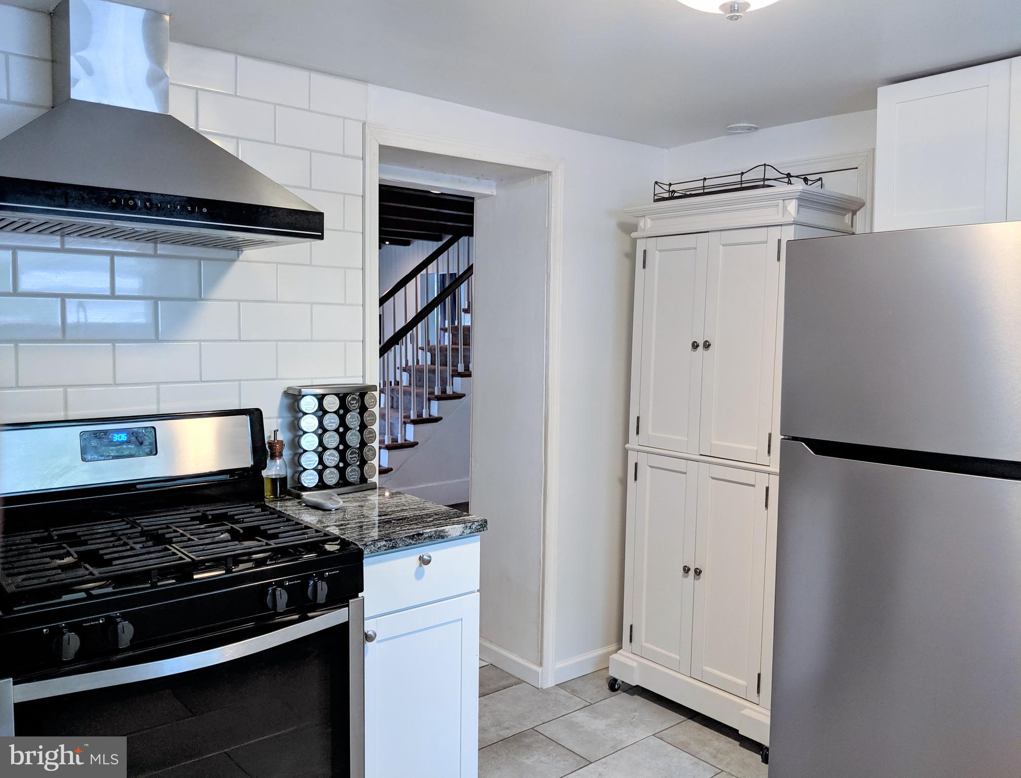 2795 York Rd. Jamison, PA 18929 - Photo 23 of 39 a kitchen with appliances and a stove top oven