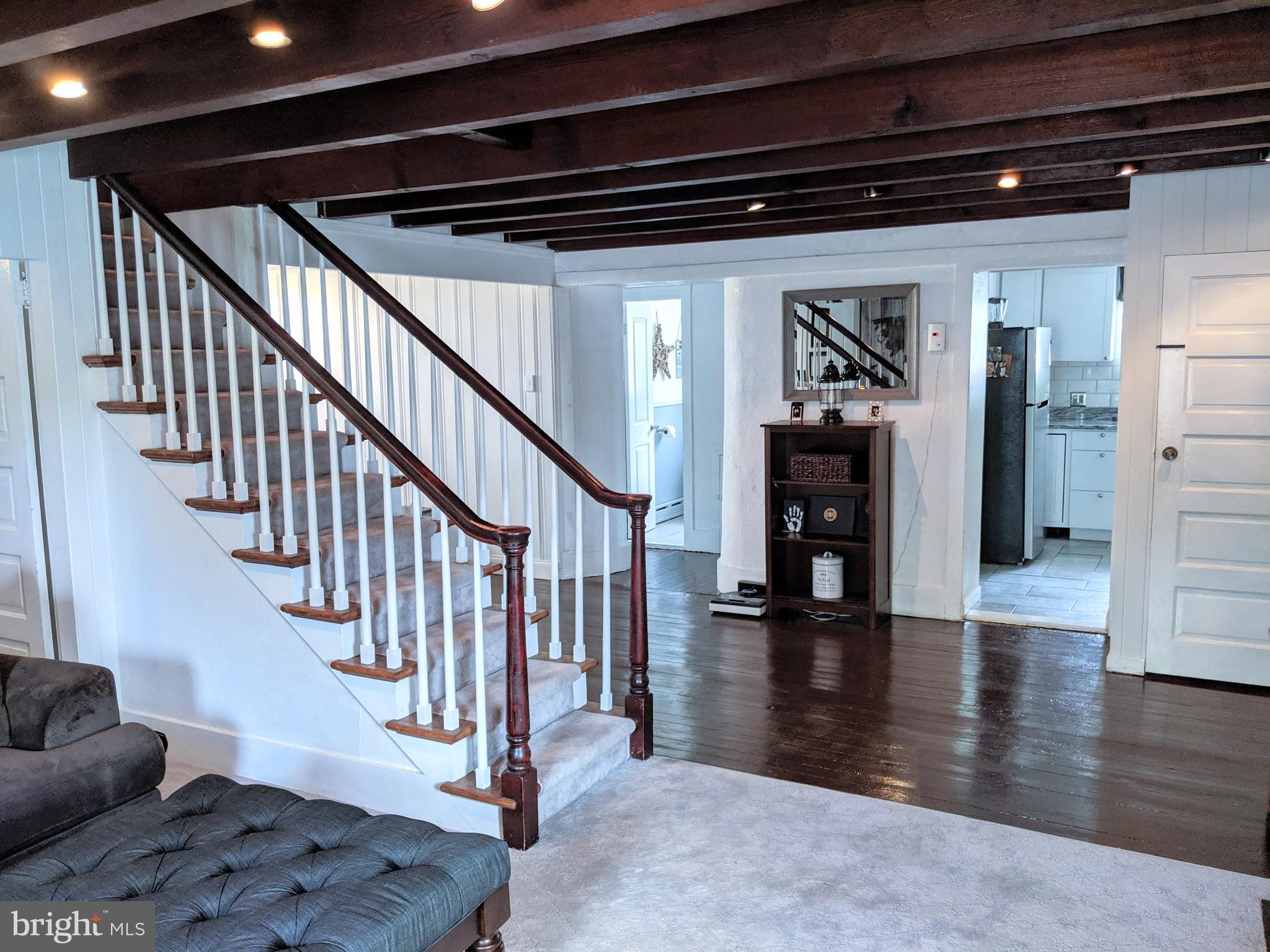 2795 York Rd. Jamison, PA 18929 - Photo 10 of 39 a view of entryway and hall with wooden floor