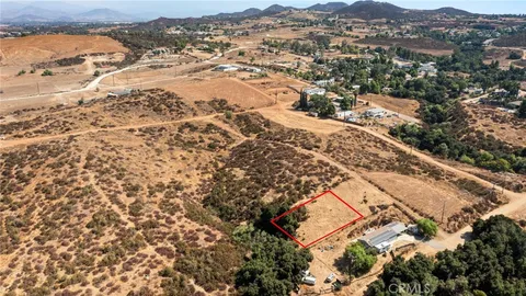 an aerial view of residential house with beach