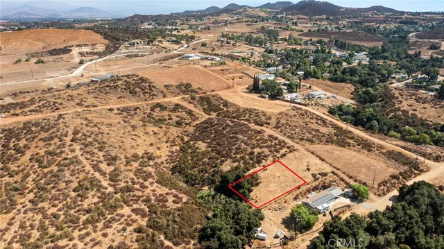 an aerial view of residential house with beach