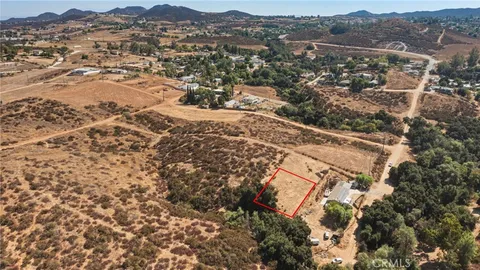 an aerial view of residential house with parking space