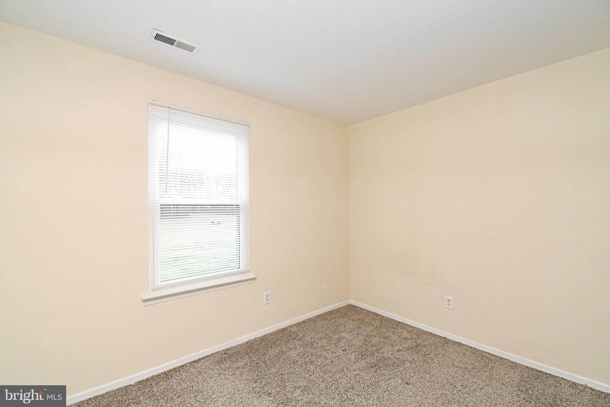 592 A Wrensong Road, Unit A Yardley, PA 19067 - Photo 18 of 36 an empty room with windows