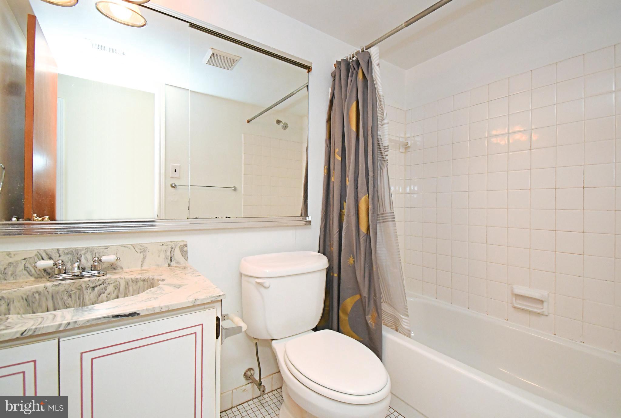 592 A Wrensong Road, Unit A Yardley, PA 19067 - Photo 23 of 36 a bathroom with a sink toilet vanity and shower