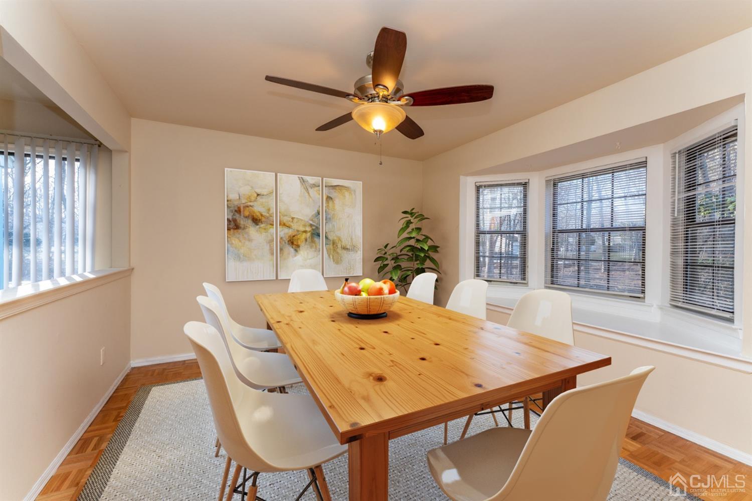 3204 Stonehedge Road Edison, NJ 08820 - Photo 2 of 22 a view of a dining room with furniture window and wooden floor