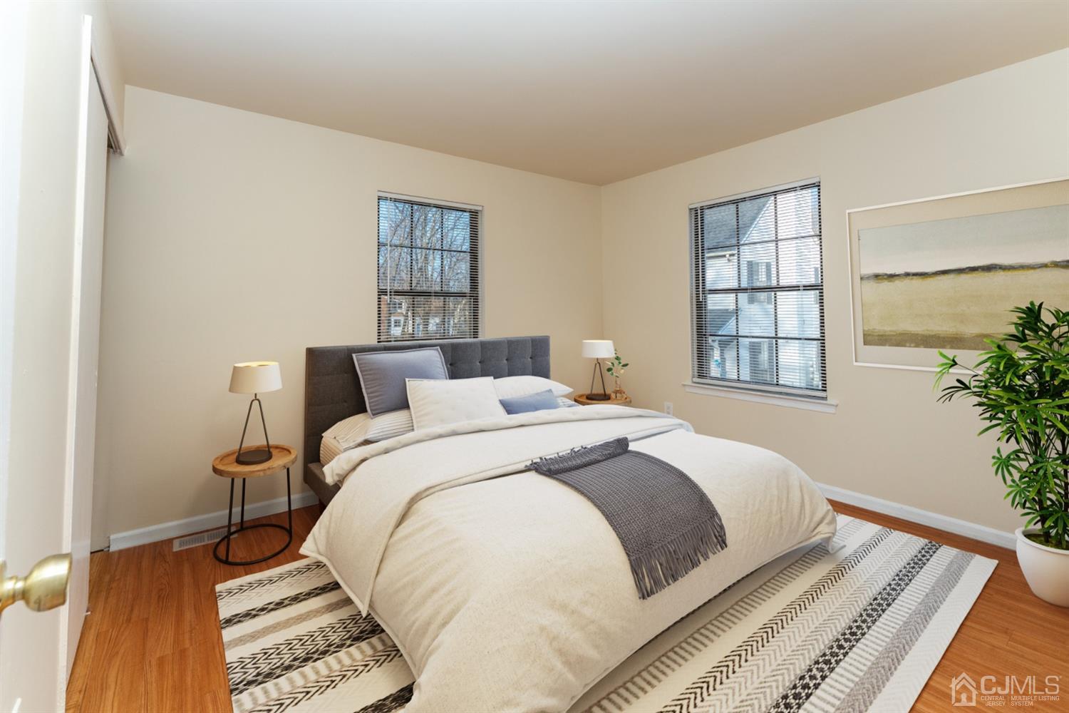 3204 Stonehedge Road Edison, NJ 08820 - Photo 13 of 22 a bedroom with a bed and a window