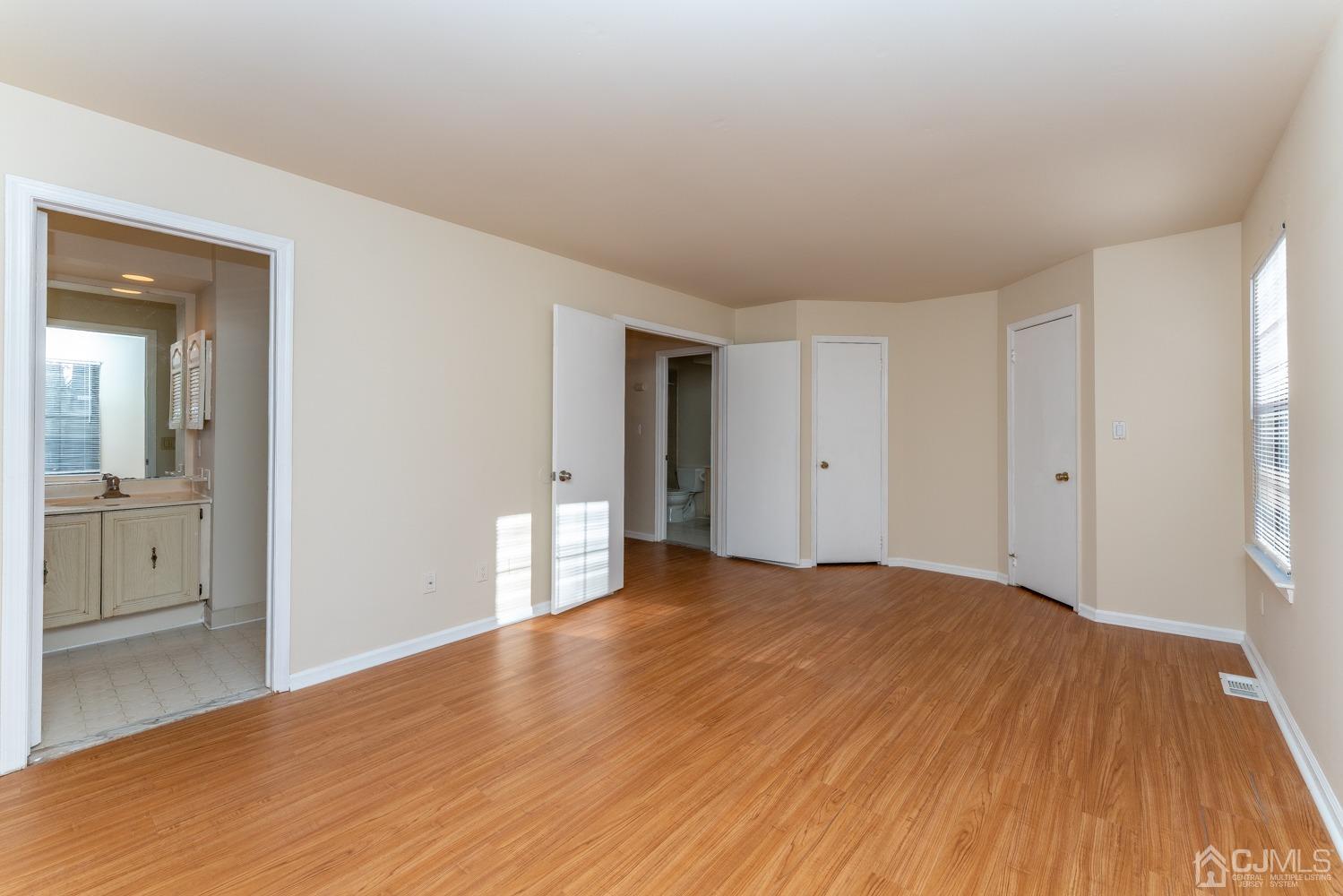 3204 Stonehedge Road Edison, NJ 08820 - Photo 17 of 22 a view of an empty room and window