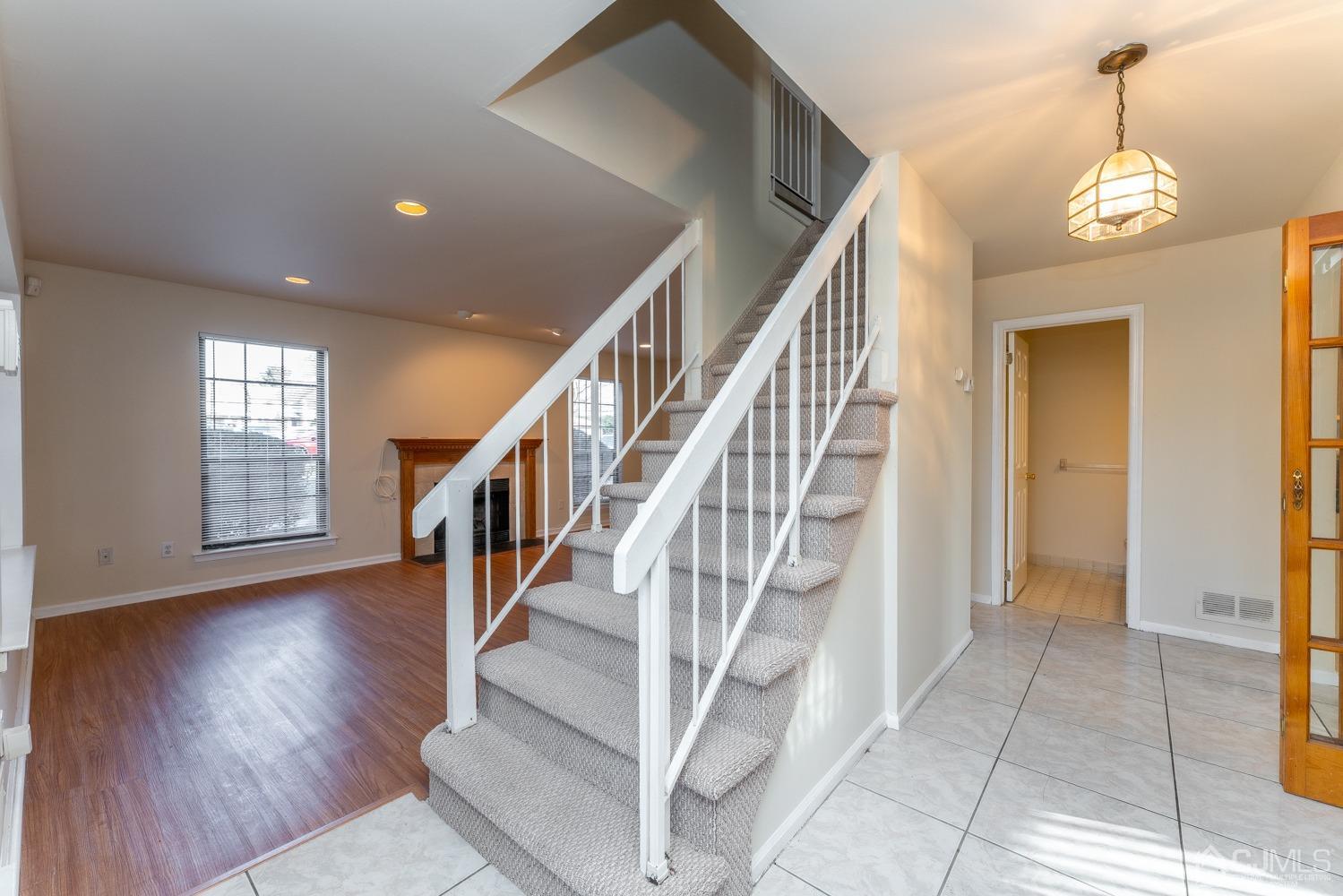 3204 Stonehedge Road Edison, NJ 08820 - Photo 6 of 22 a view of entryway and hall with wooden floor
