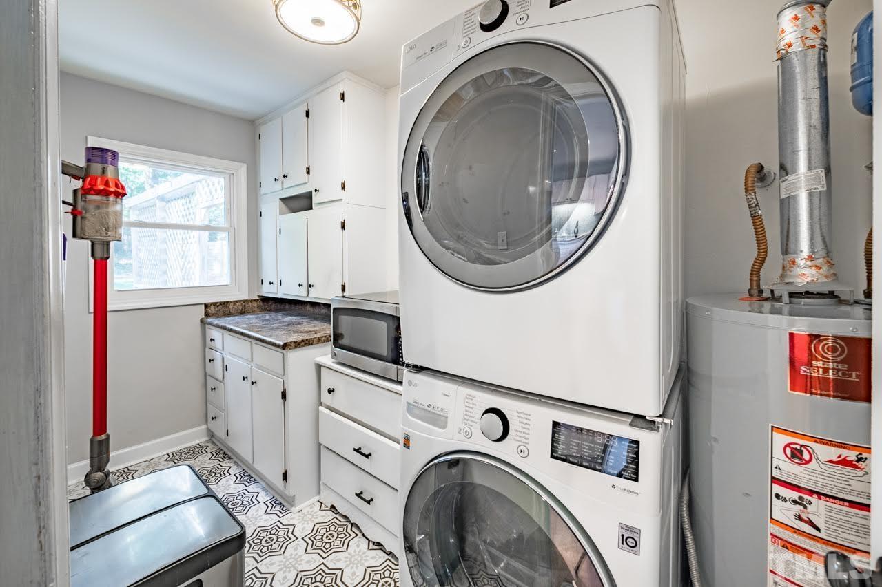 1105 Somerset Road Raleigh, NC 27610 - Photo 9 of 19 a utility room with dryer and washer