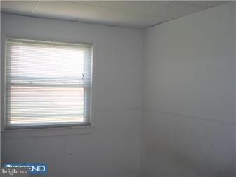 9 Pump Branch Road Berlin, NJ 08009 - Photo 4 of 11 a view of a window in an empty room
