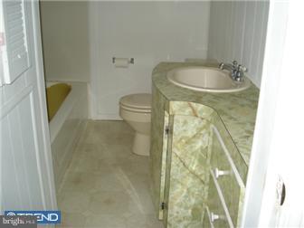 9 Pump Branch Road Berlin, NJ 08009 - Photo 6 of 11 a bathroom with a sink and toilet