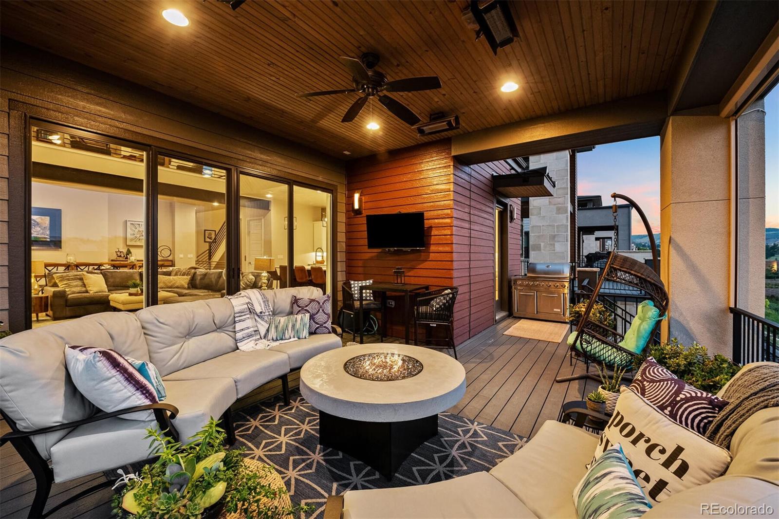 10109 Bellwether Lane Lone Tree, CO 80124 - Photo 2 of 40 a living room with furniture and a large window