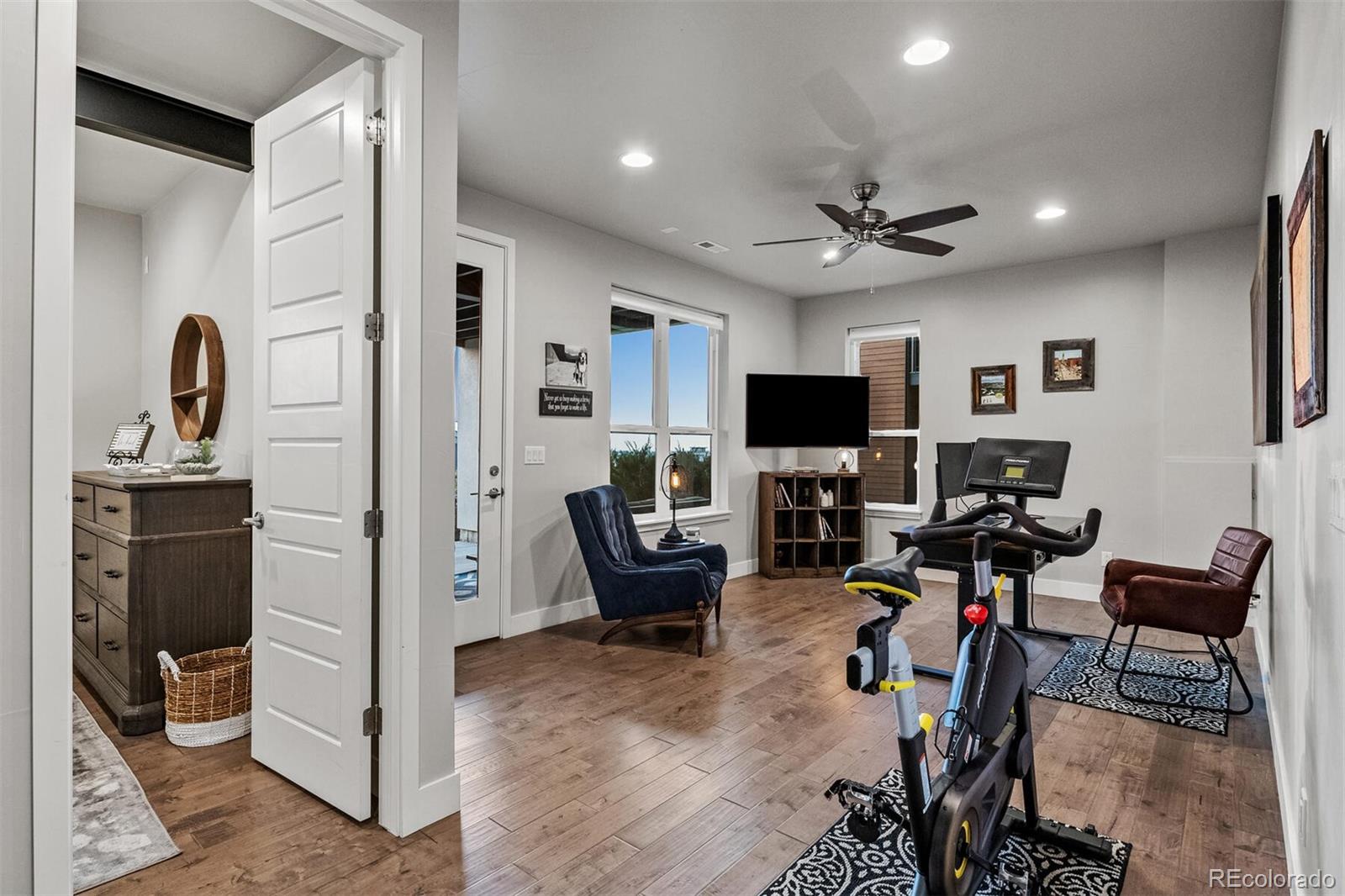 10109 Bellwether Lane Lone Tree, CO 80124 - Photo 29 of 40 a view of a livingroom with furniture and a flat screen tv