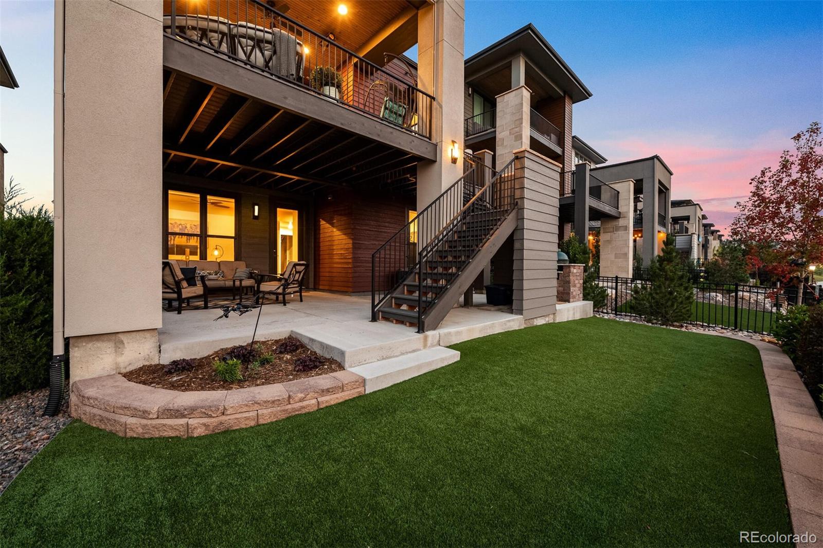 10109 Bellwether Lane Lone Tree, CO 80124 - Photo 37 of 40 a view of a house with backyard