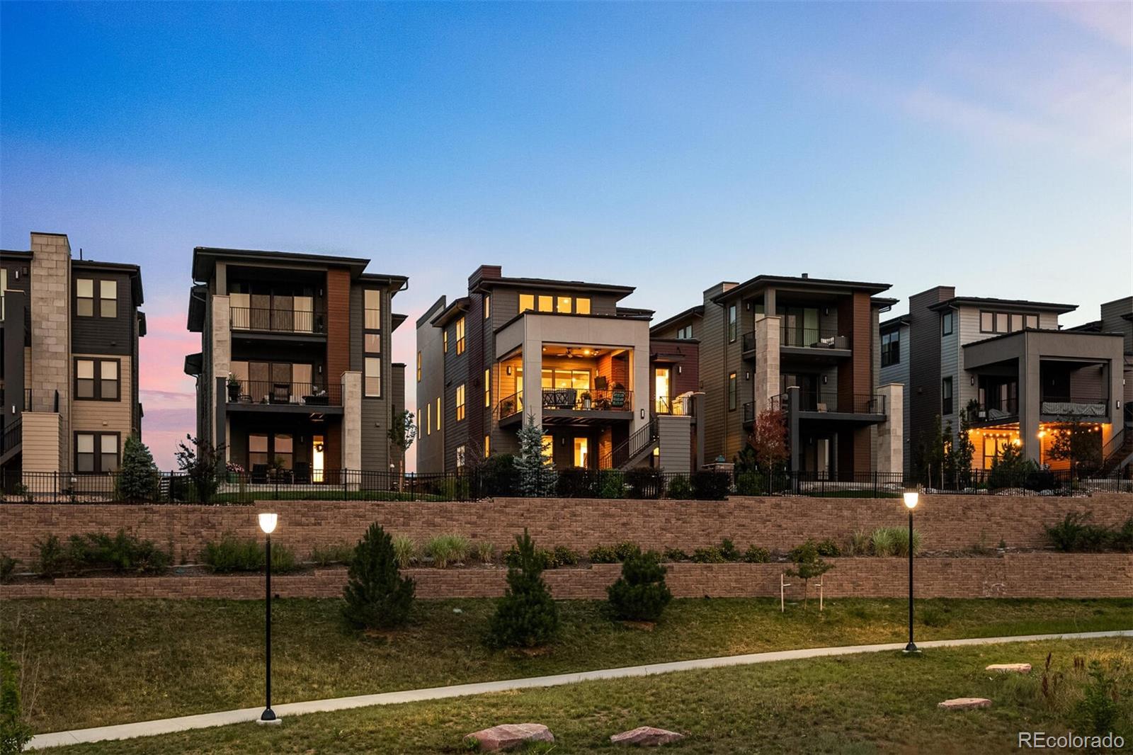 10109 Bellwether Lane Lone Tree, CO 80124 - Photo 38 of 40 a front view of a house with garden