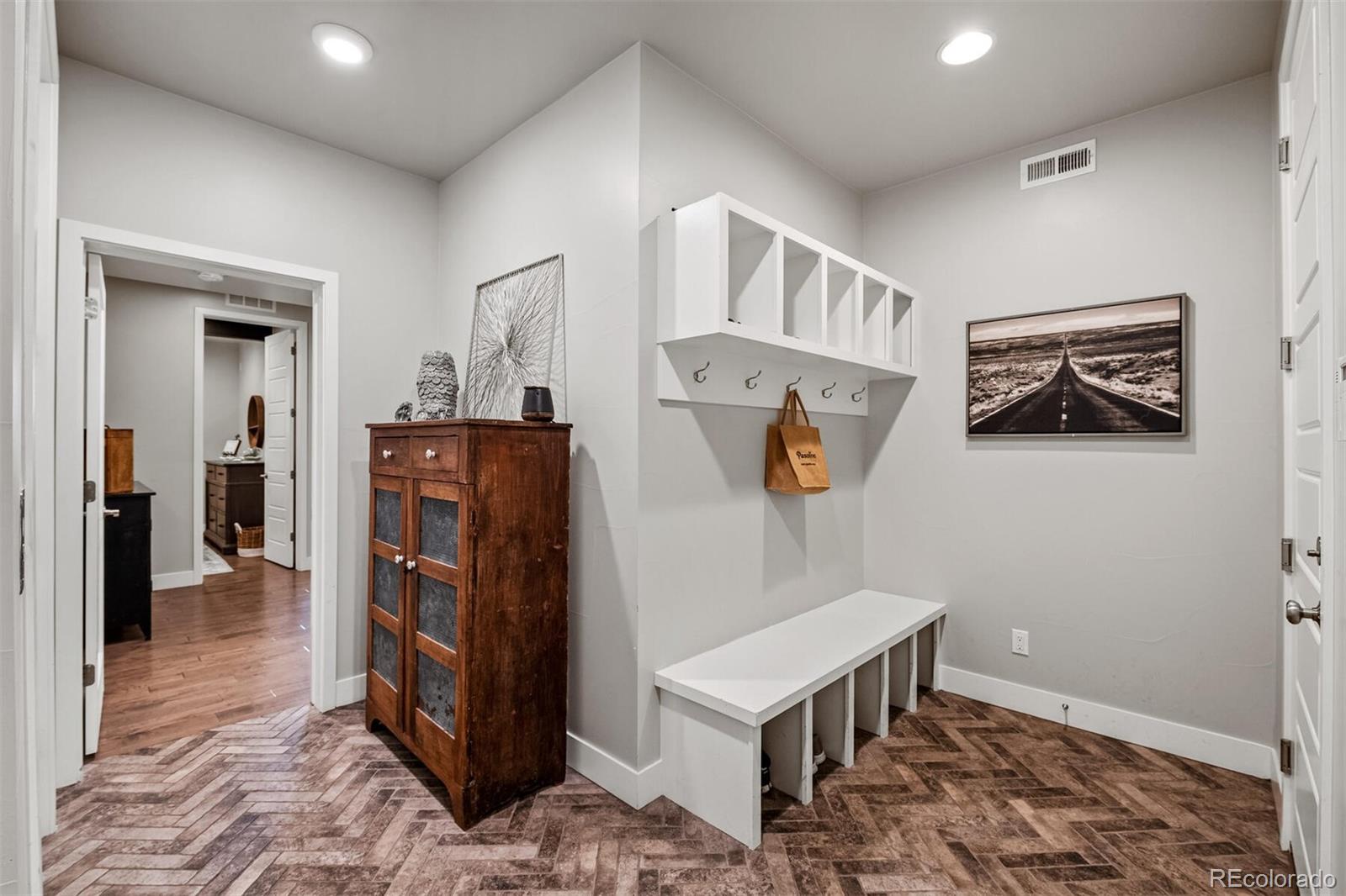 10109 Bellwether Lane Lone Tree, CO 80124 - Photo 39 of 40 a view of a hallway with seating area
