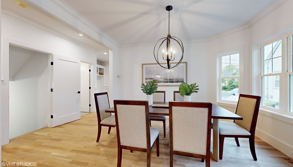 49 Ledge Hill Road Boston, MA 02132 - Photo 13 of 34 a view of a dining room with furniture window and wooden floor