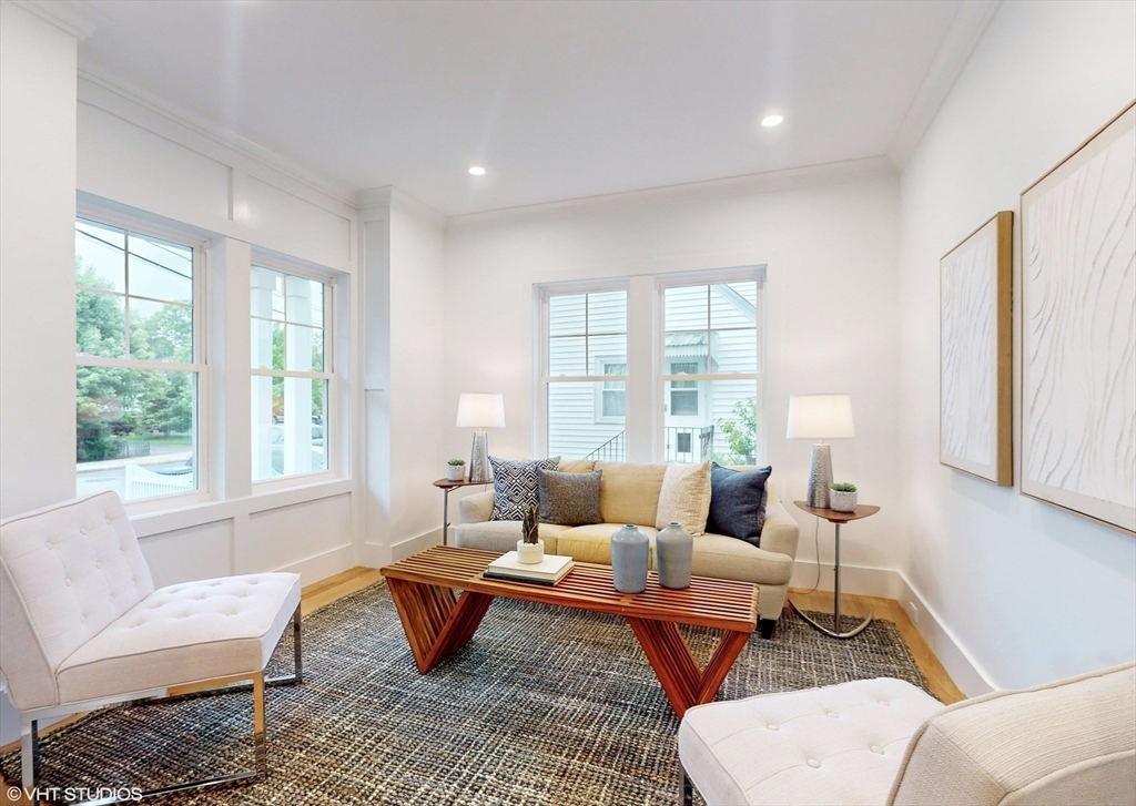 49 Ledge Hill Road Boston, MA 02132 - Photo 17 of 34 a living room with furniture and a window