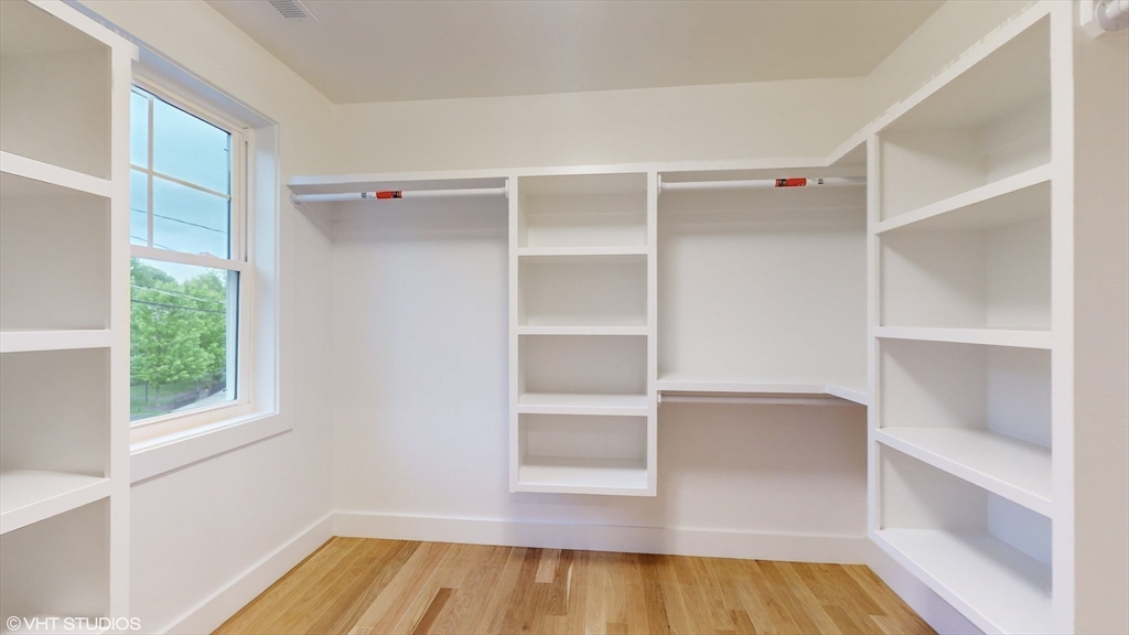49 Ledge Hill Road Boston, MA 02132 - Photo 22 of 34 a view of a room with wooden floor and a window