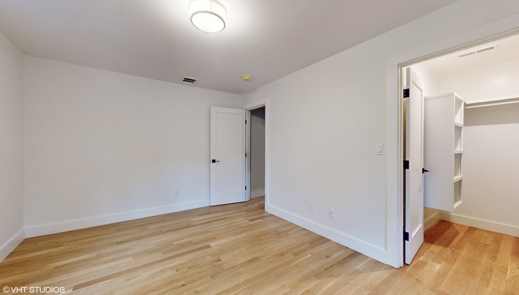 49 Ledge Hill Road Boston, MA 02132 - Photo 29 of 34 a view of a room with wooden floor