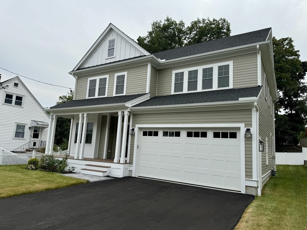 49 Ledge Hill Road Boston, MA 02132 - Photo 34 of 34 a front view of a house with a yard