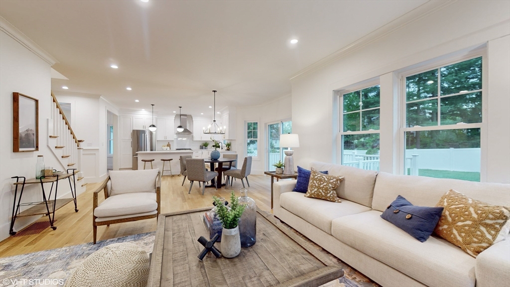 49 Ledge Hill Road Boston, MA 02132 - Photo 5 of 34 a living room with furniture and a large window