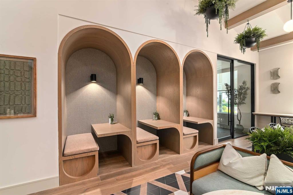 18 Park Avenue, Unit 1319 Old Tappan, NJ 07675 - Photo 5 of 33 a living room with furniture and potted plants