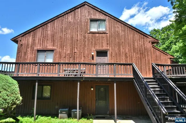 a front view of a house with balcony