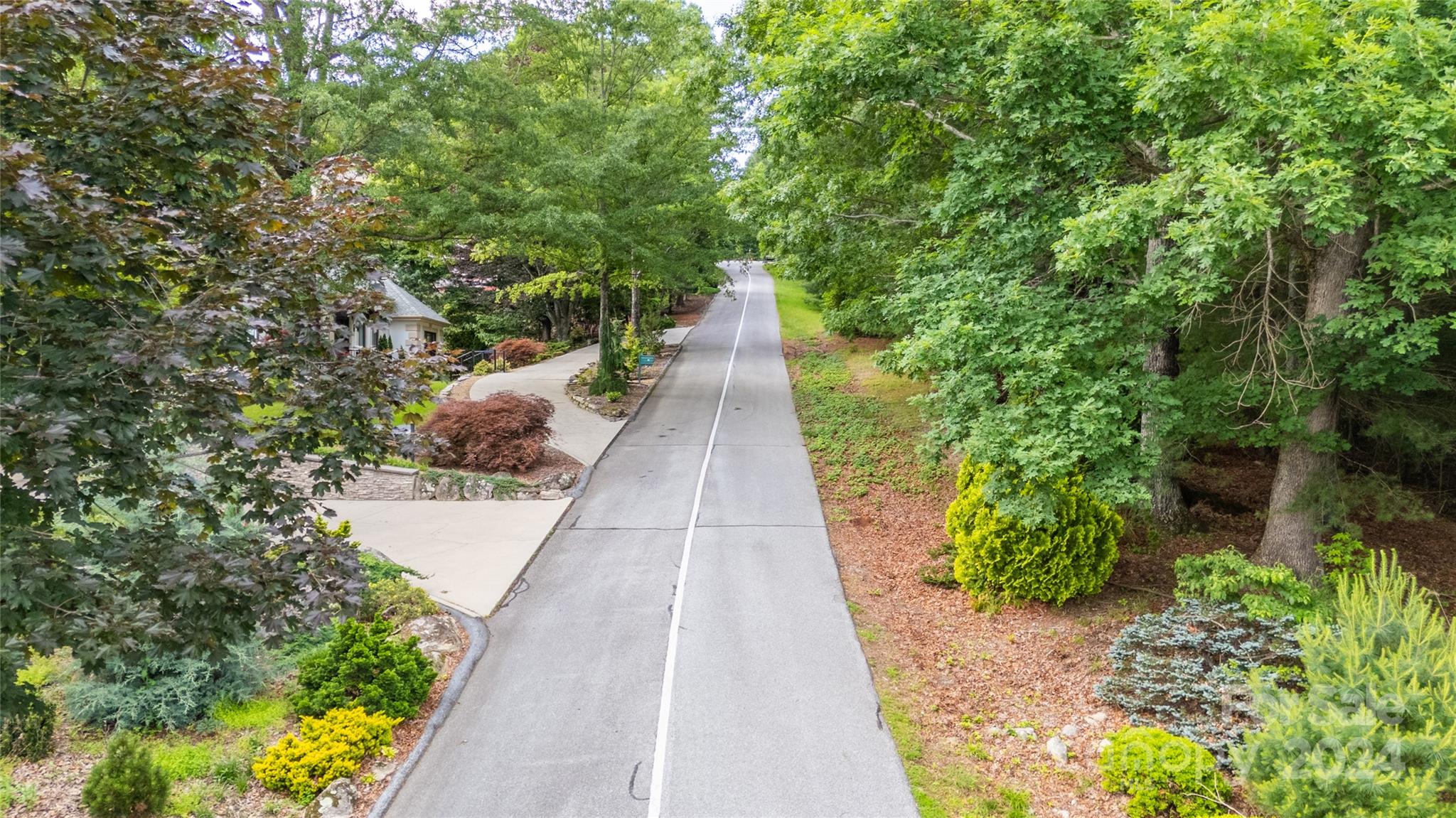 0 South Ridge Drive, Unit 61/62 Hendersonville, NC 28739 - Photo 3 of 17 a view of an outdoor space with a house