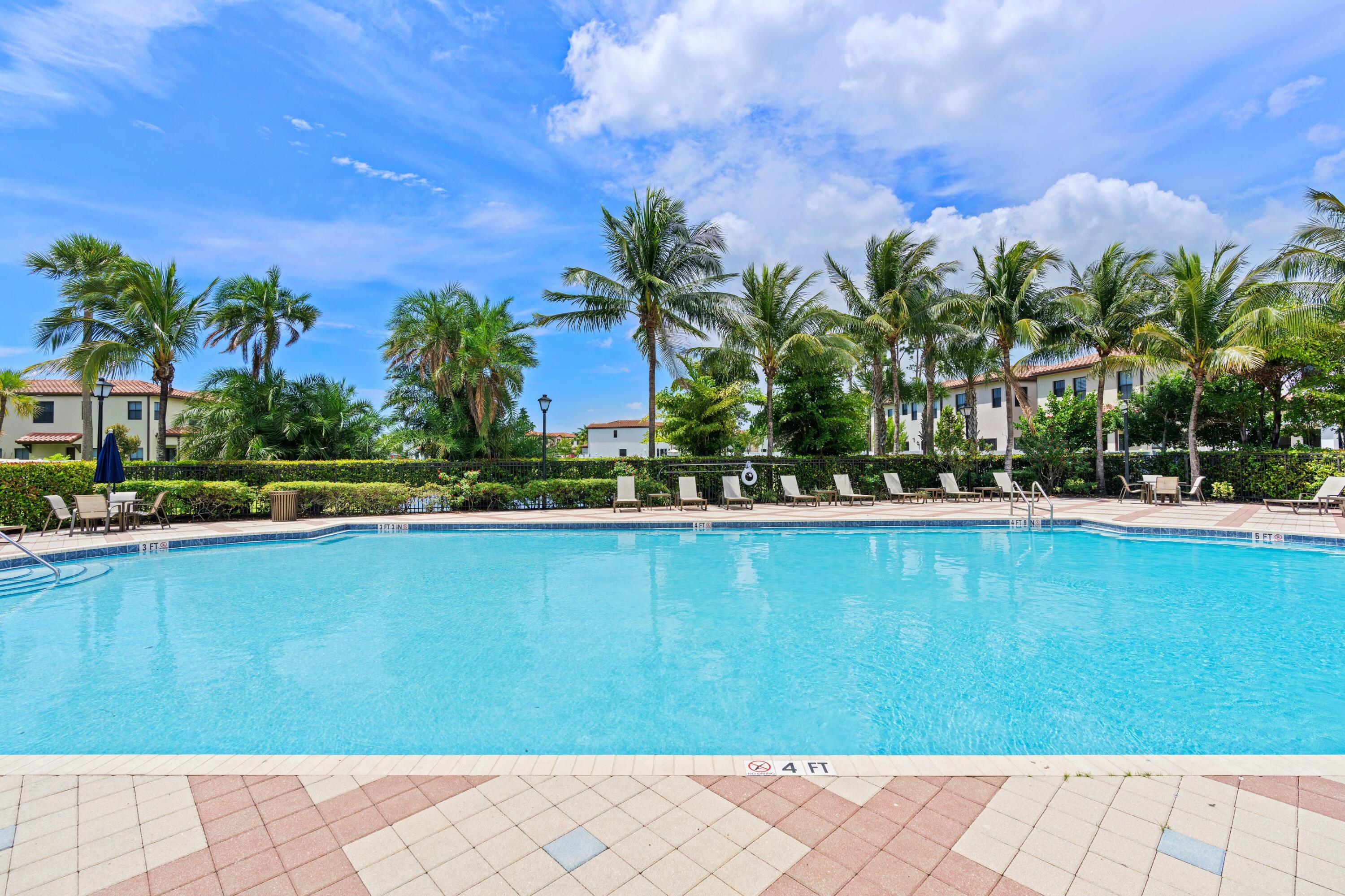 3006 Hoptree Way Riviera Beach, FL 33410 - Photo 28 of 35 a view of swimming pool from a yard