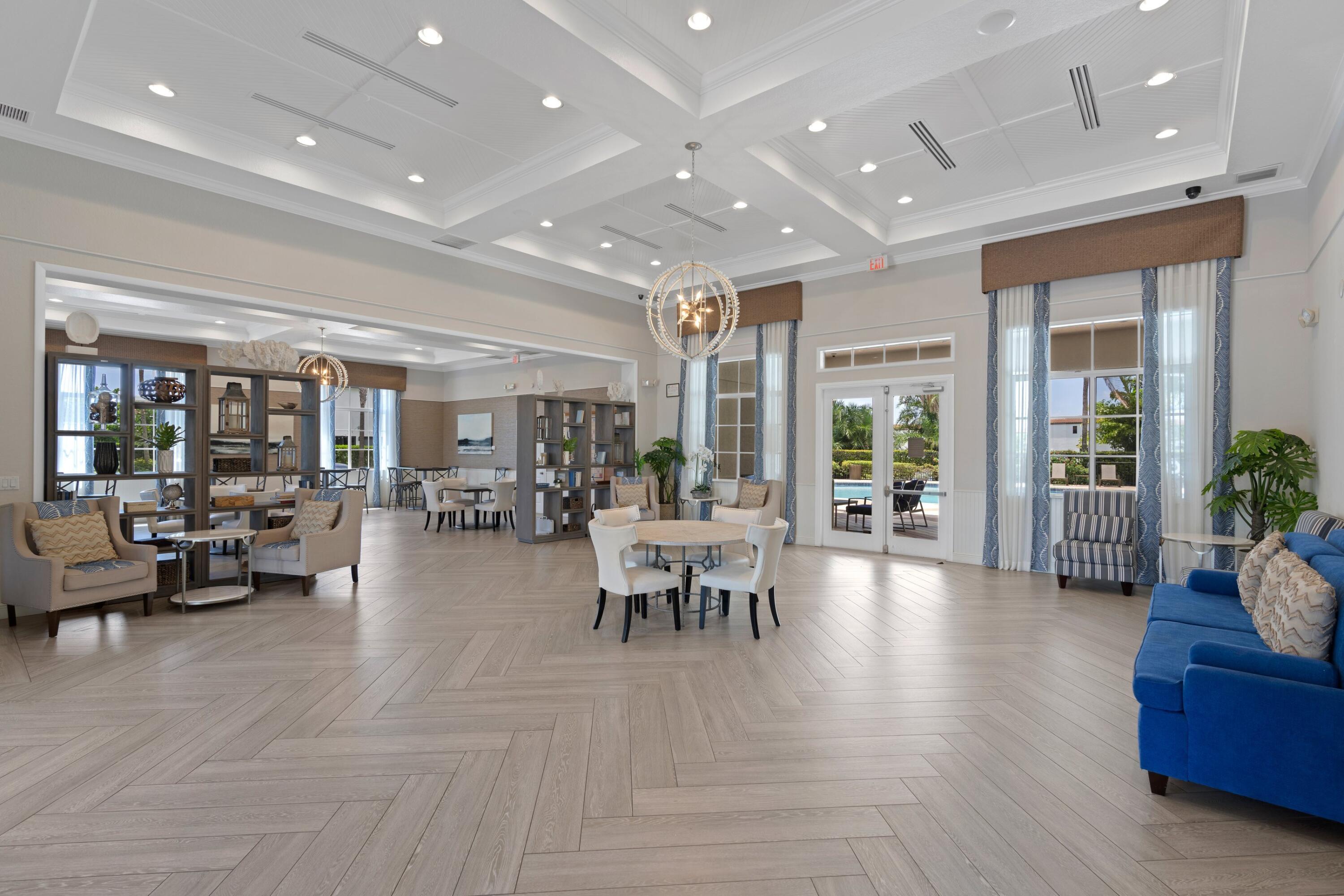 3006 Hoptree Way Riviera Beach, FL 33410 - Photo 34 of 35 a lobby with furniture and floor to ceiling window