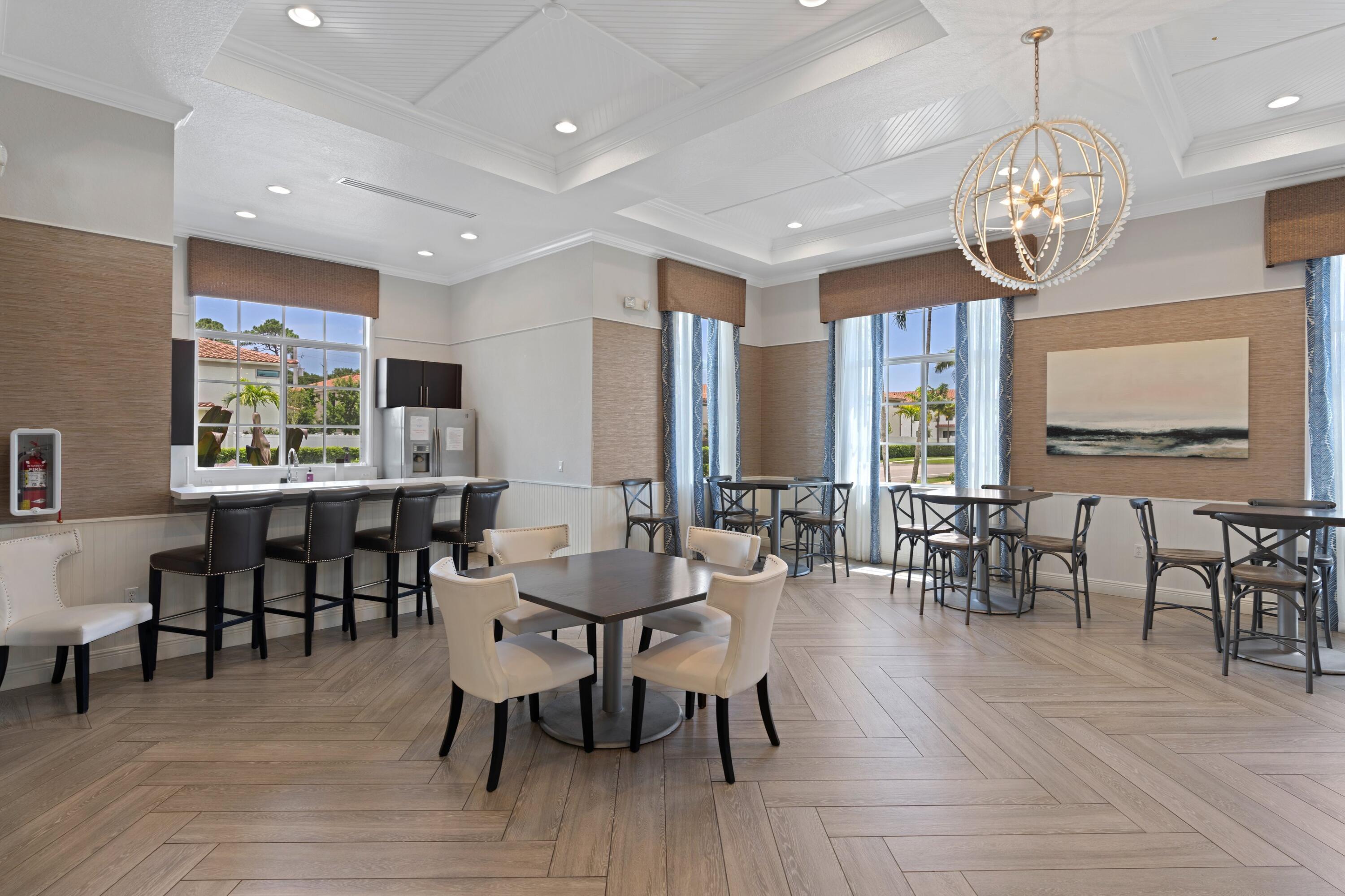 3006 Hoptree Way Riviera Beach, FL 33410 - Photo 35 of 35 a view of a dining room with furniture window and wooden floor