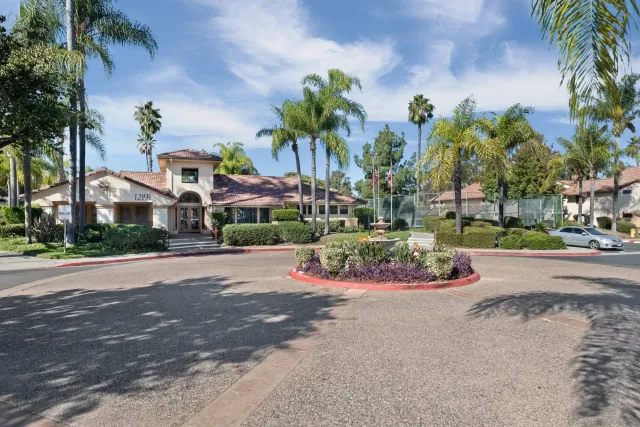 a view of a house with swimming pool