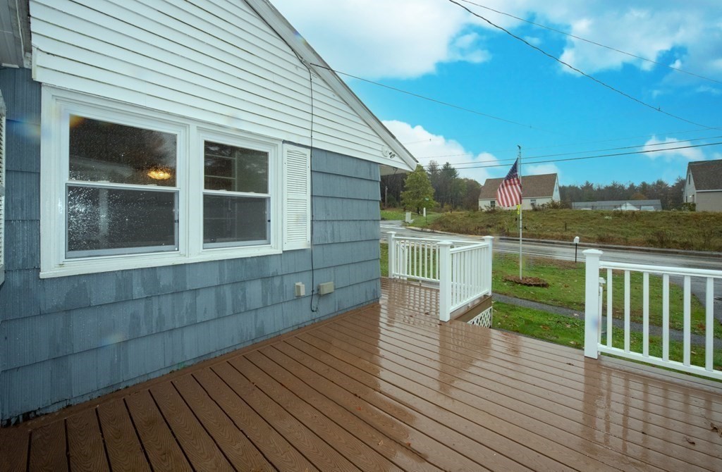 263 State Road Templeton, MA 01436 - Photo 30 of 31 a view of a balcony with wooden floor and outdoor seating