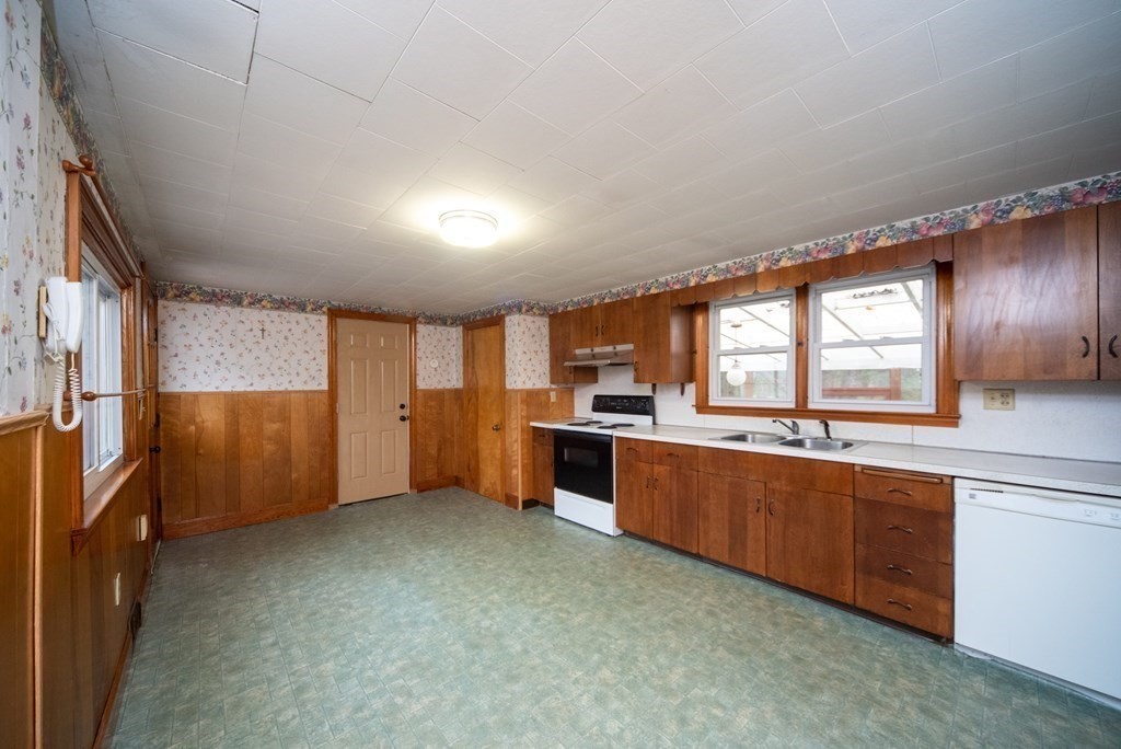 263 State Road Templeton, MA 01436 - Photo 4 of 31 a large kitchen with a large window and stainless steel appliances