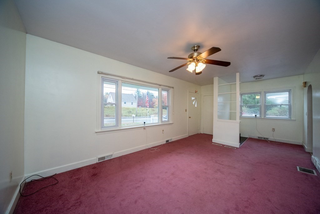 263 State Road Templeton, MA 01436 - Photo 10 of 31 an empty room with fan and windows