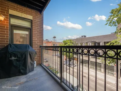 a view of a street from a balcony