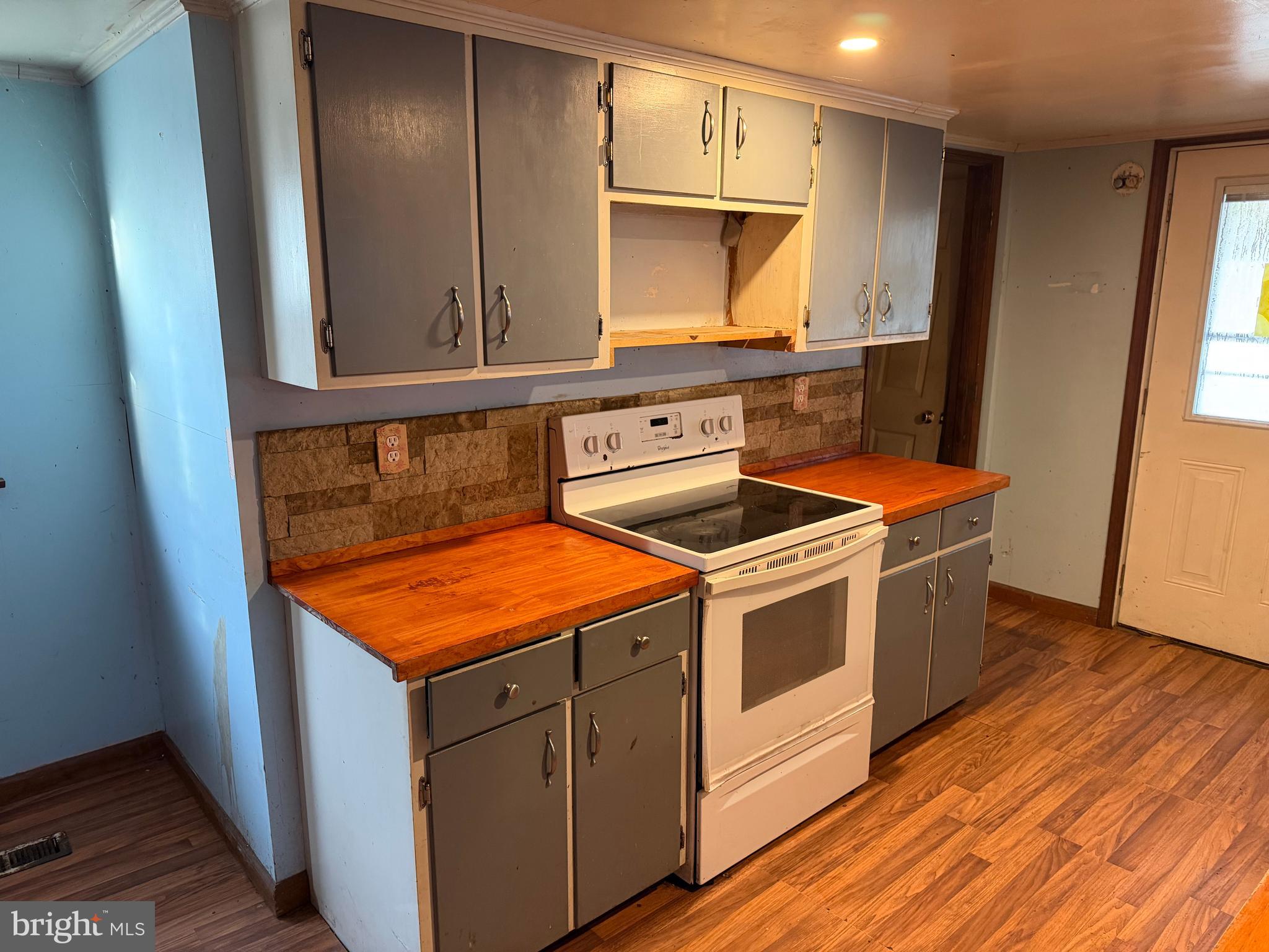 2257 South Forge Road Palmyra, PA 17078 - Photo 15 of 34 a kitchen with stainless steel appliances granite countertop a stove a sink and a microwave