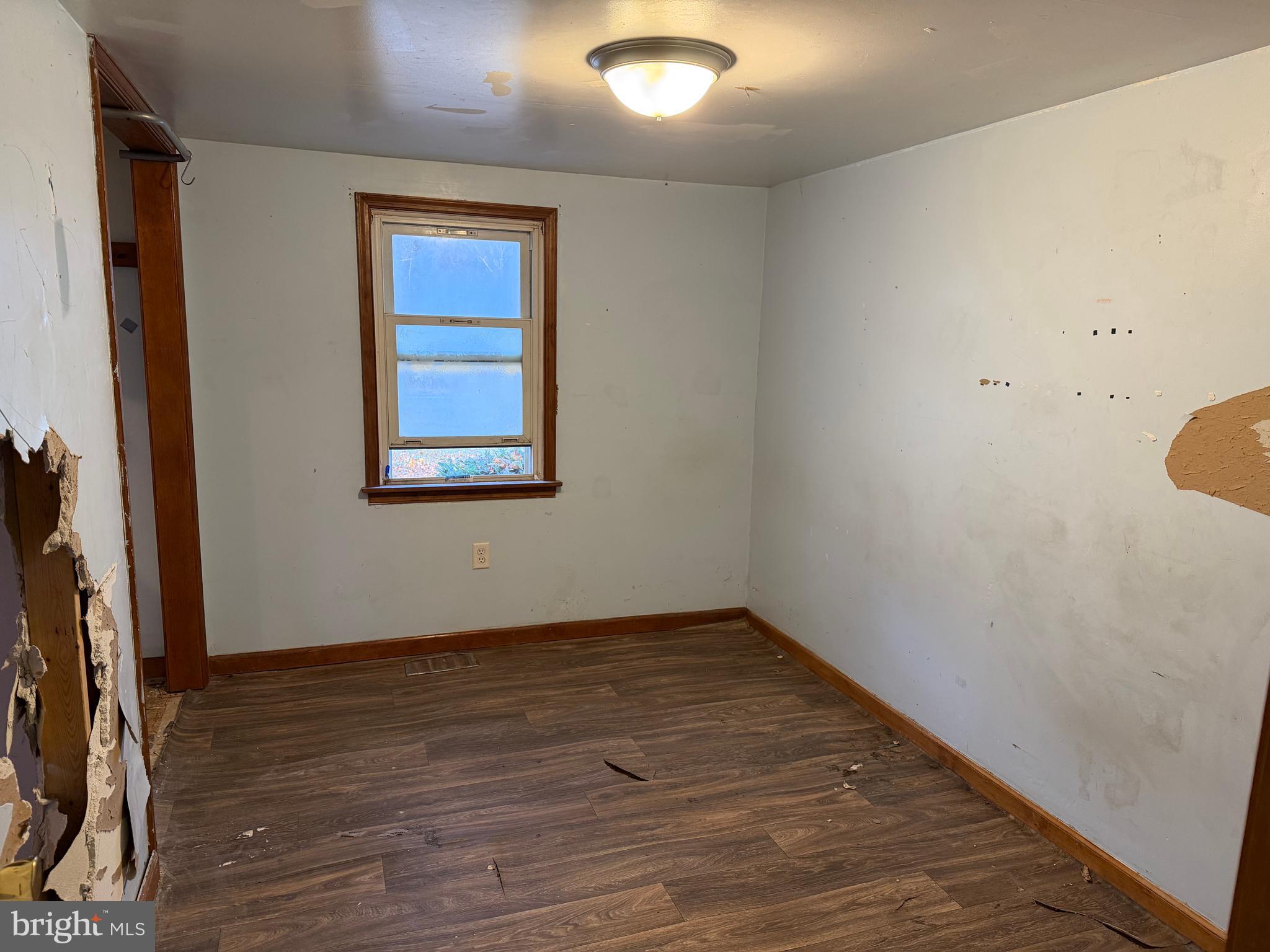 2257 South Forge Road Palmyra, PA 17078 - Photo 23 of 34 an empty room with wooden floor and windows