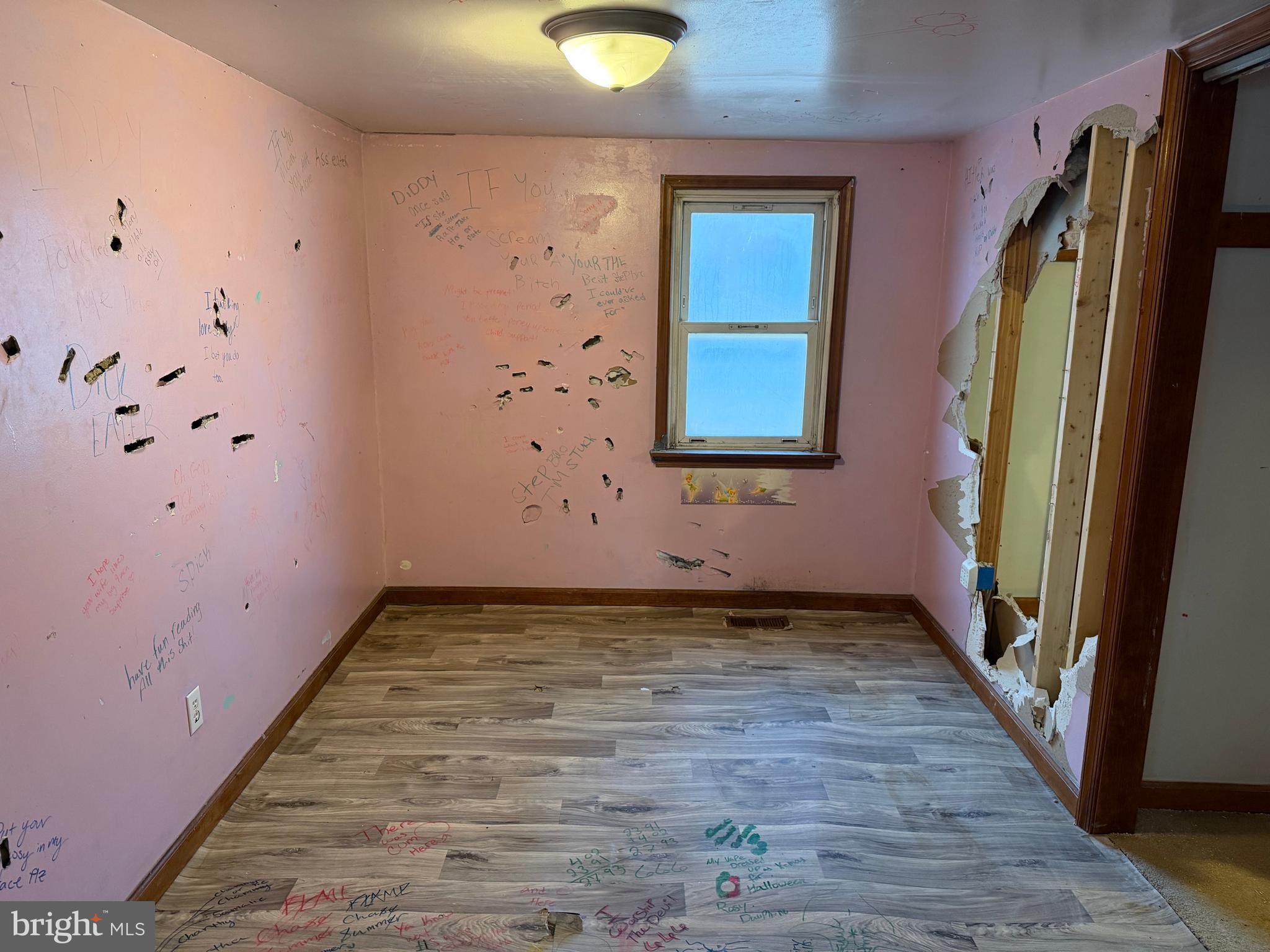2257 South Forge Road Palmyra, PA 17078 - Photo 24 of 34 a view of an empty room with window and wooden floor