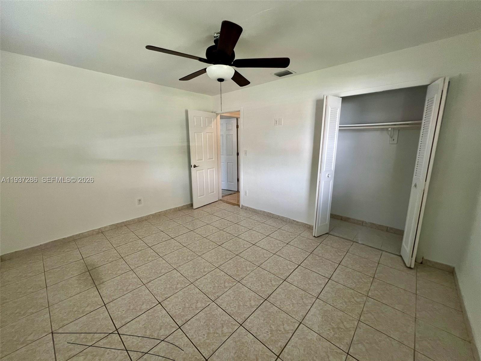 11950 Southwest 199th Street, Unit 1 Miami, FL 33177 - Photo 17 of 30 a view of empty room