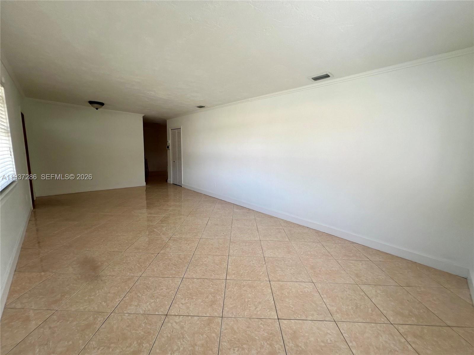 11950 Southwest 199th Street, Unit 1 Miami, FL 33177 - Photo 8 of 30 a view of an empty room