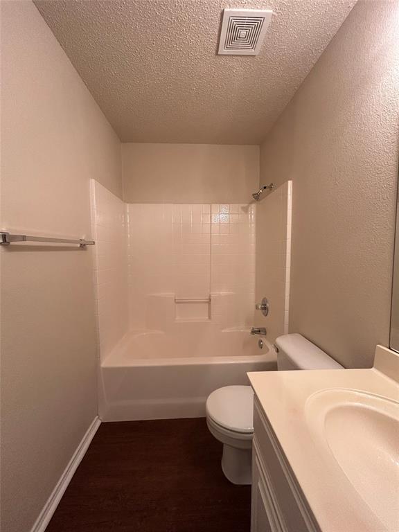 7917 Rattlers Court Arlington, TX 76002 - Photo 13 of 21 a bathroom with a sink a toilet and shower