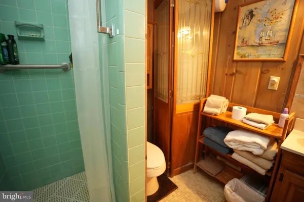 a bathroom with a sink and toilet