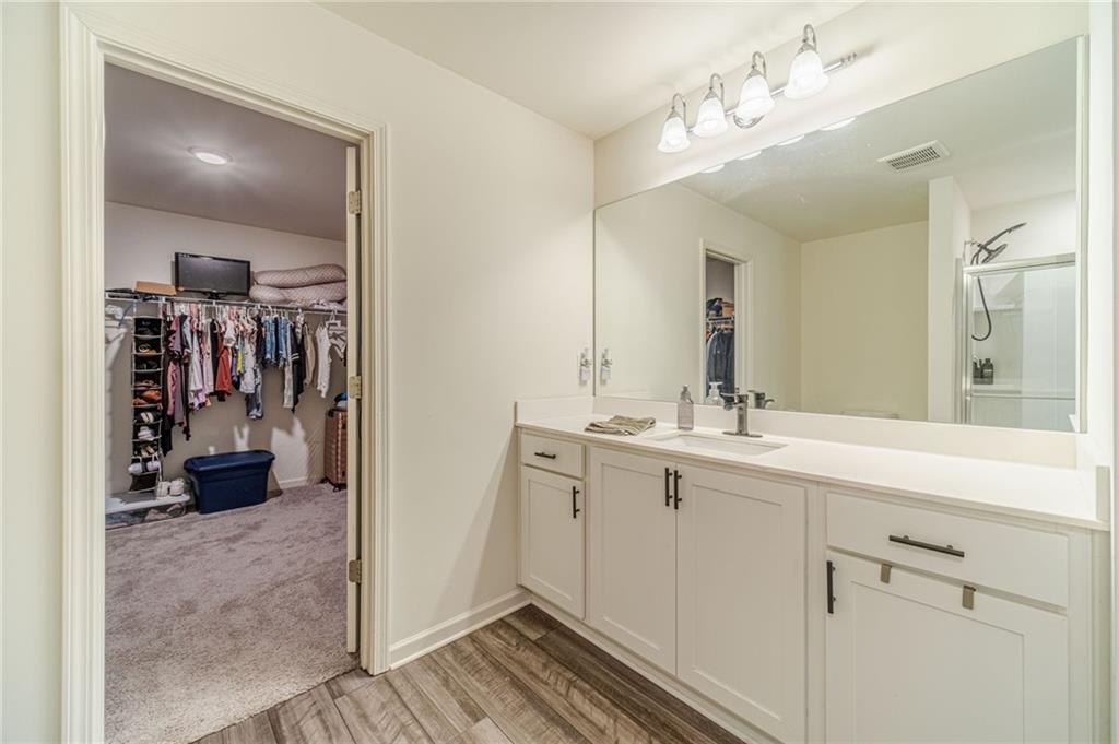 222 Knightsbridge Lane Winder, GA 30680 - Photo 21 of 39 a en suite bathroom with a sink double vanity and a mirror