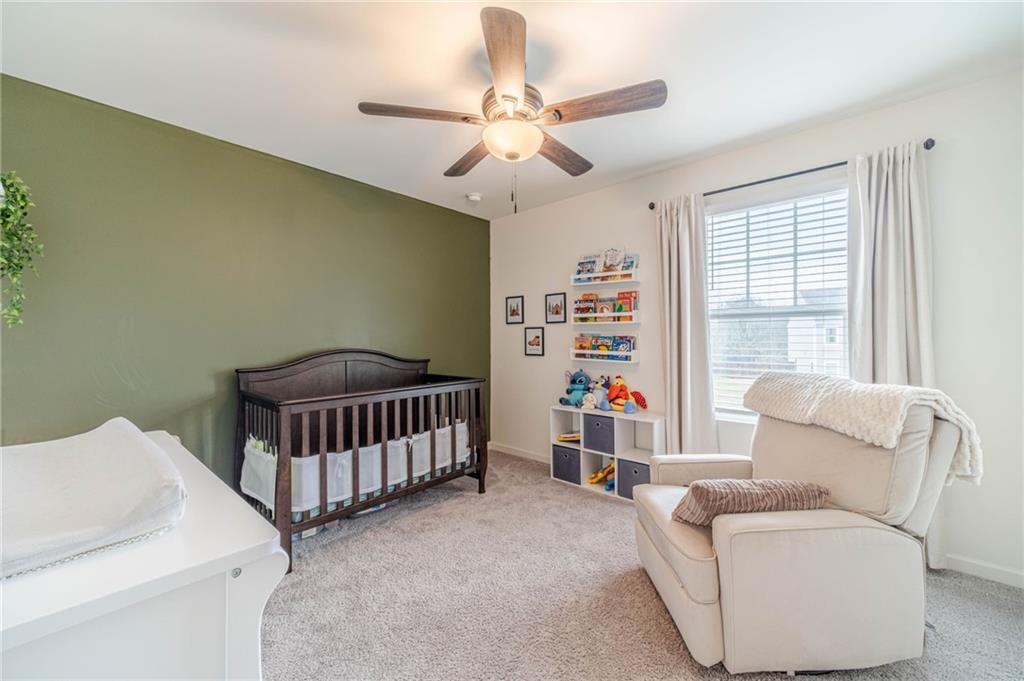 222 Knightsbridge Lane Winder, GA 30680 - Photo 25 of 39 a bedroom with furniture and white walls